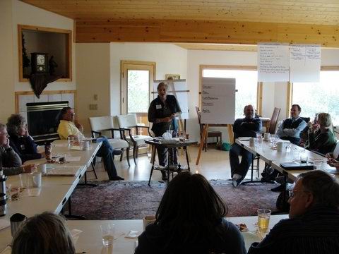 Workshop meeting with presenter and flipcharts
